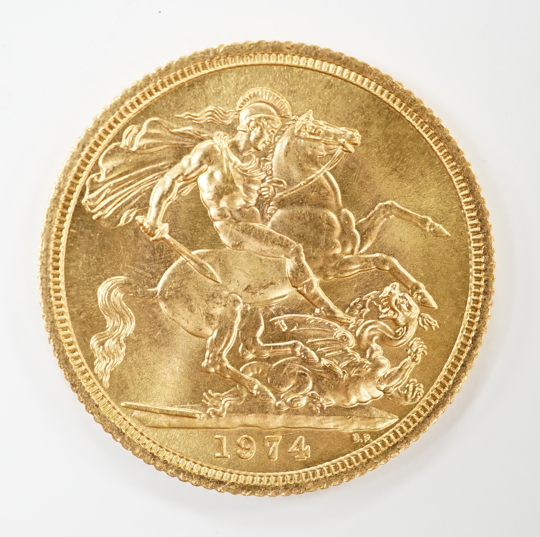 An Elizabeth II 1974 gold sovereign.